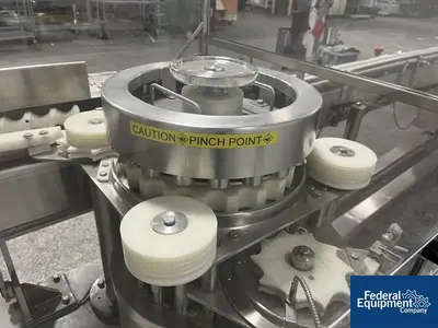 Unknown Rotary Capper, with Conveyor