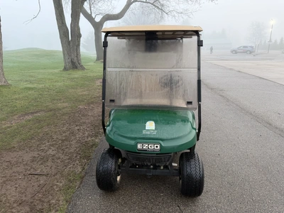 (1) 2015 E-Z-Go golf cart with a Kawasaki gas engine, includes canopy, ball cover, club cover, fold-...