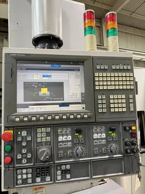 USED 2012 OKUMA 2SP-V40
