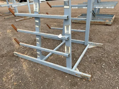Metal 8-Tier Cantilever Rack, welded together, arms stick out approx. 20” and have metal brackets th...