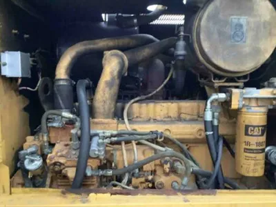 1998 Caterpillar 140HNA