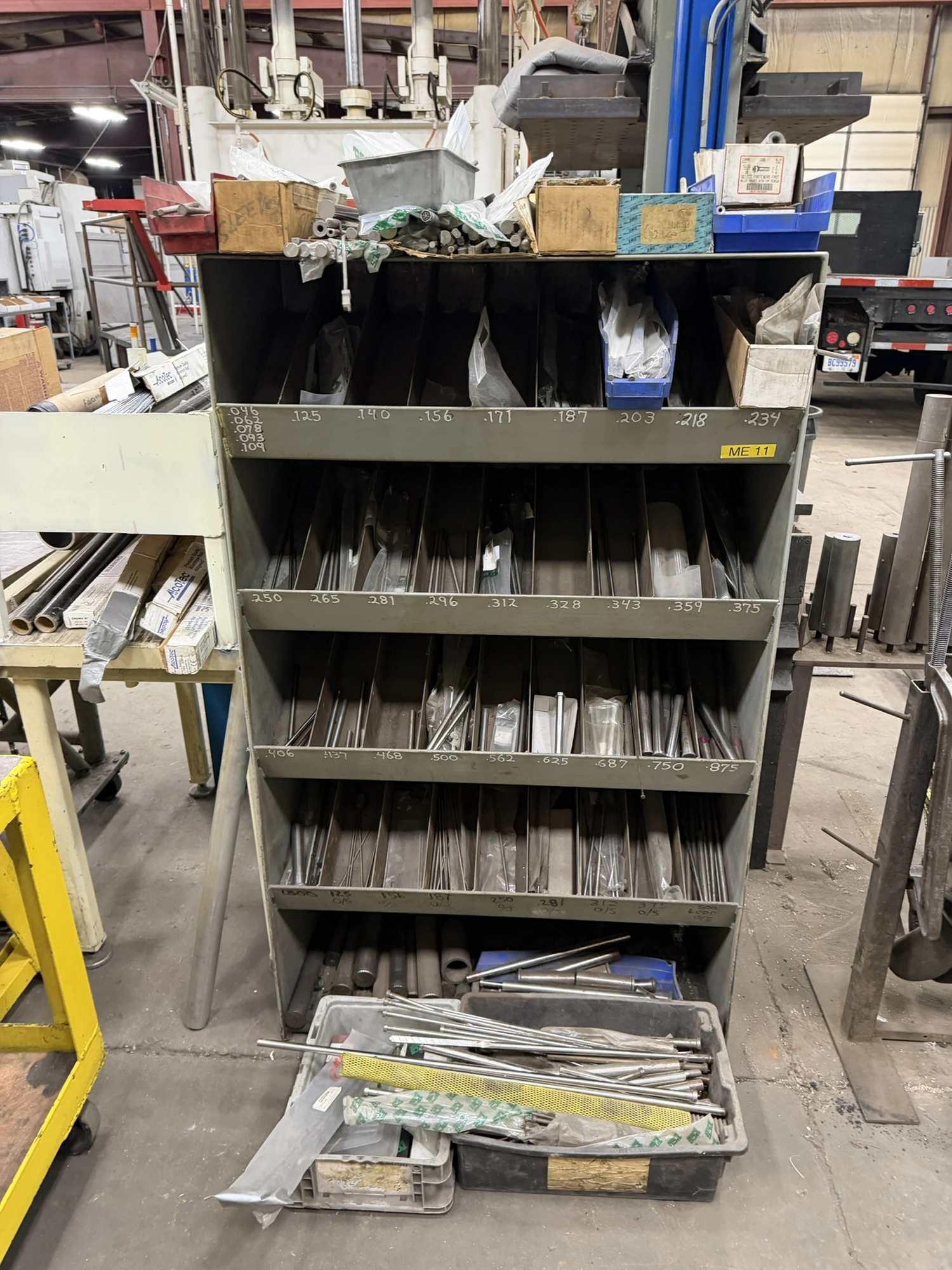(1) metal rack, 36" wide x 18" deep x 60" tall, with contents of assorted ejector pins.