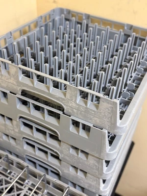set of dishwasher racks and silverware holders
