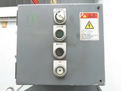 Enomoto 37"W x 8' 4"L Chip Conveyor 26"Belt 46"H Discharge 220V 3PH Chain Drive