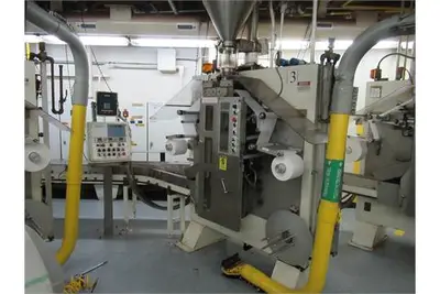 Young & Co. stand up filter pouch filler with inline feeder