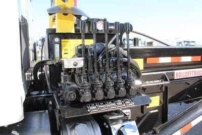 New | in-Stock 2027 PETERBILT 548 Hooklifts & Roll-Offs Texas US | Roll Off Truck World #1492004