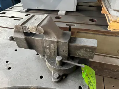 32" X 64" T SLOTTED WORK TABLE WITH VISE. STOCK # 0735022