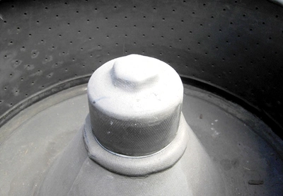 Ametek 26 X 12 perforate basket centrifuge, rubber-lined.