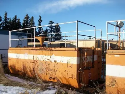 USED 20 M3 (120 BBL) SKID MOUNTED 2 COMPARTMENT MUD TANK