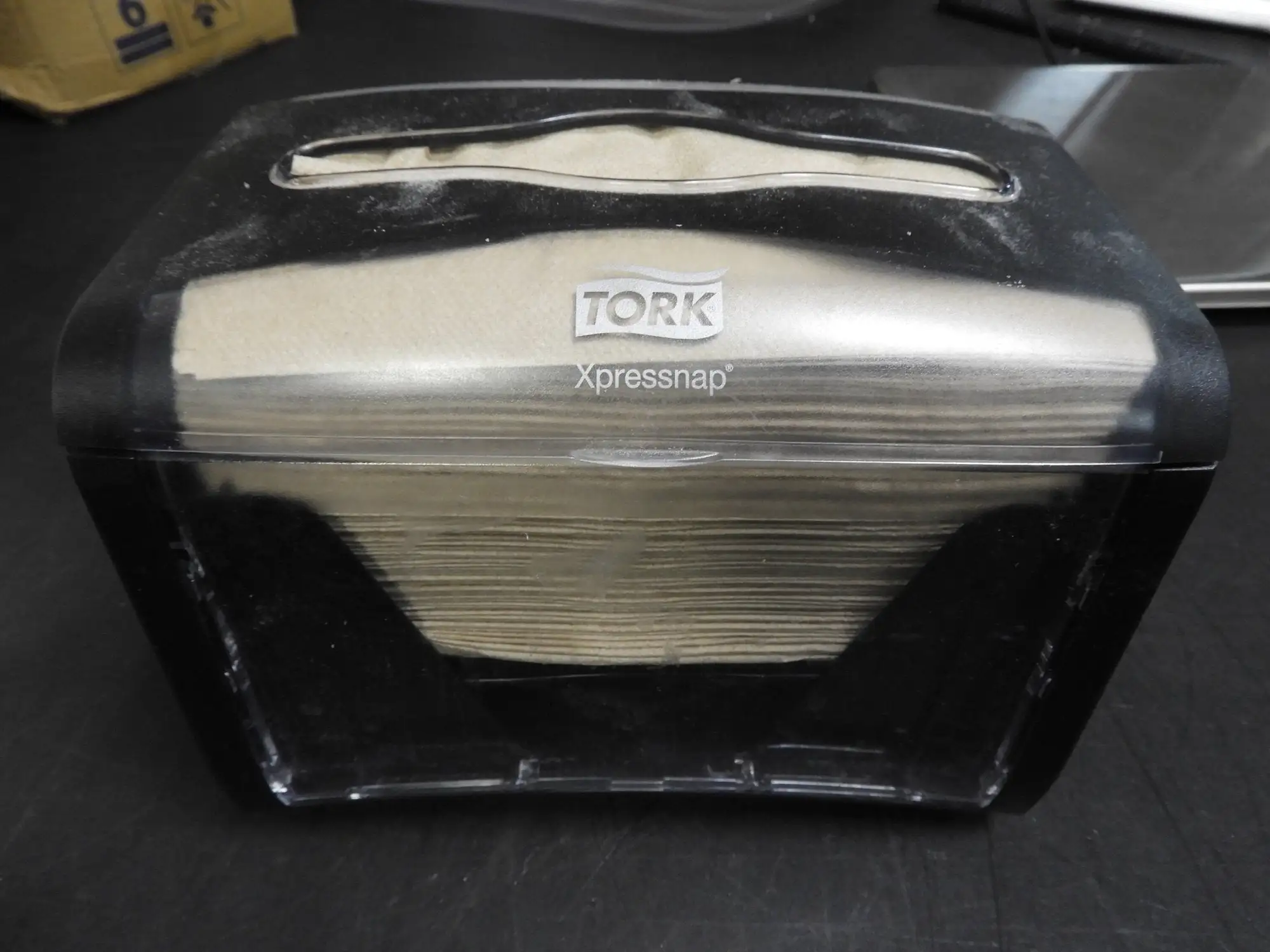 Used tork Used Tork Xpressnap Tabletop Napkin Dispenser, 7.9"W x 5.9"D x 6.1"H, Black Restaurant Front of House Furnishings Illinois US | Falcon Restaurant Supply #1376634