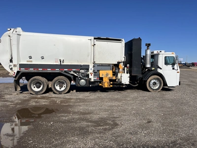 USED 2013 MACK LEU633 REFUSE PACKER BODY WITH AUTO ARM.