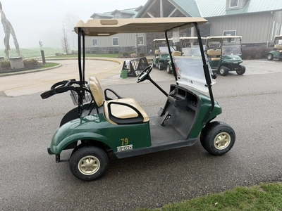 (1) 2014 E-Z-Go golf cart with a Kawasaki gas engine, does not include Club canopy, ball carrier, fo...