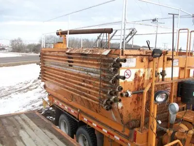 USED 20 M3 (120 BBL) SKID MOUNTED 2 COMPARTMENT MUD TANK
