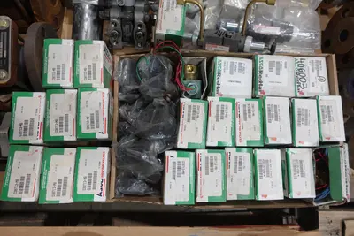 4 PALLETS OF ASSORTED VALVES AND VALVE PARTS