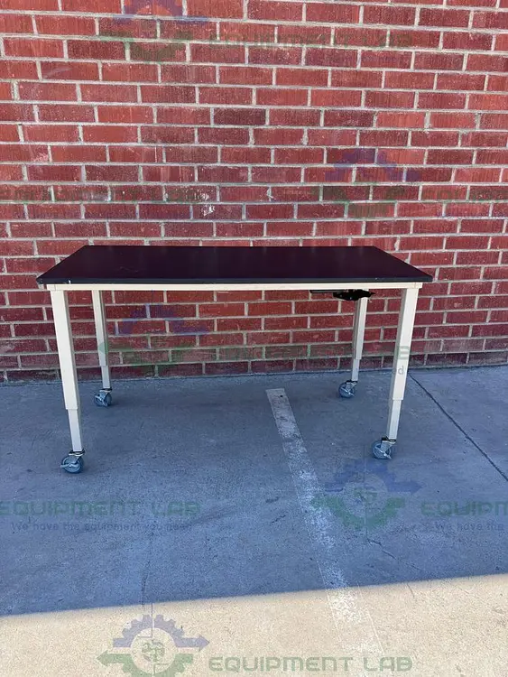 Used PHENOLIC / COMPOSITE RESIN ADJUSTABLE  SCIENCE TABLE WITH WHEELS-30" W X 62" L Work Benches California US | Equipment Lab #488837