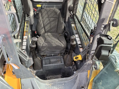 Used 2015 JOHN DEERE 326E WITH 1,162 HOURS Skid Steer Loaders Michigan US | Miedema Asset Management Group #1424758