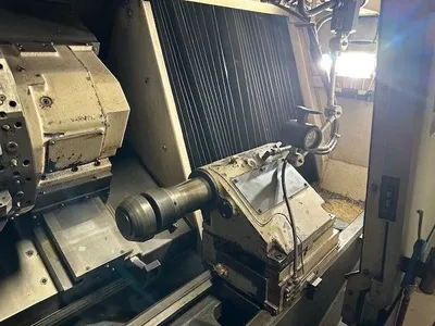 USED 2010 OKUMA GENOS L400E