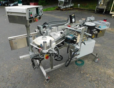 USED NEWMAN WRAP AROUND LABELER NV II