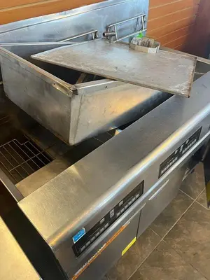 Frymaster FPPH355 Natural Gas 150 lb. 3 Unit High-Efficiency Gas Floor Fryer System with CM3.5 Controls - 240,000 BTUFrymaster FPPH355 Natural Gas 150 lb. 3 Unit High-Efficiency Gas Floor Fryer System with CM3.5 Controls - 240,000 BTU