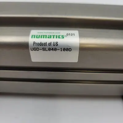 USED NUMATICS NUMATICS PNEUMATIC CYLINDER UGD-SL040-100D WITH A BRACKET