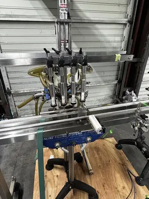 Used INLINE FILLING SYSTEMS 4 HEAD SEMI-AUTOMATIC FILLER FOFBT-4 Overflow Pressure Gravity Liquid Fillers Oregon US | Ager Tank & Equipment Co. #1256626