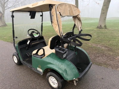 (1) 2015 E-Z-Go golf cart with a Kawasaki gas engine, includes canopy, ball cover, club cover, fold-...