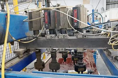 USED CUSTOM-BUILT DESOUTTER MULTIPLE-SPINDLE VERTICAL DRILLING AND GROOVING MACHINE