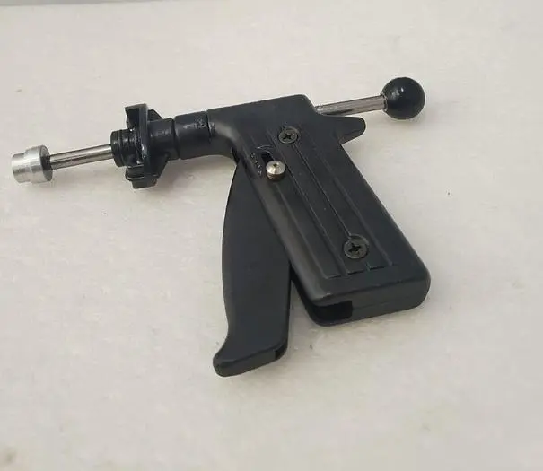 DISPENSING GUN