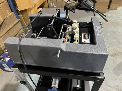 Advent model 310 semi-automatic pressure sensitive wraparound labeler
