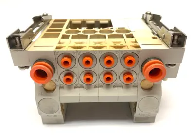 VV5Q11-04N3FS0-D0RS | SMC  Plug In Manifold Assembly 4-Port - Used