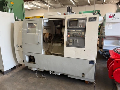 OKUMA & HOWA ACT 35 LATHES, SLANT BED, N/C & CNC | Wheeler Machinery Sales (1)
