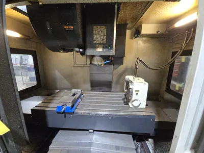 2018 Leadwell V-50i VMC w/ 30-Slot ATC, Conveyor, Kurt Vise, Fanuc Oi-MF Controller