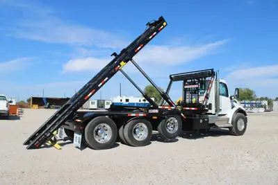 New | in-Stock 2027 PETERBILT 548 Rolloff Trucks Texas US | Roll Off Truck World #1492018