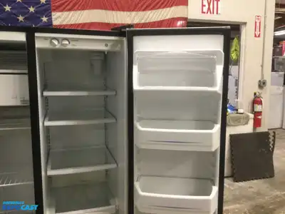 USED GE STAINLESS STEEL AND BLACK SIDE X SIDE REFRIGERATOR HEAVY DUTY ENERGY STAR