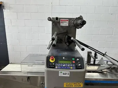 USED DOBOY PACKAGING MACHINERY INC STRATUS WRAPPER