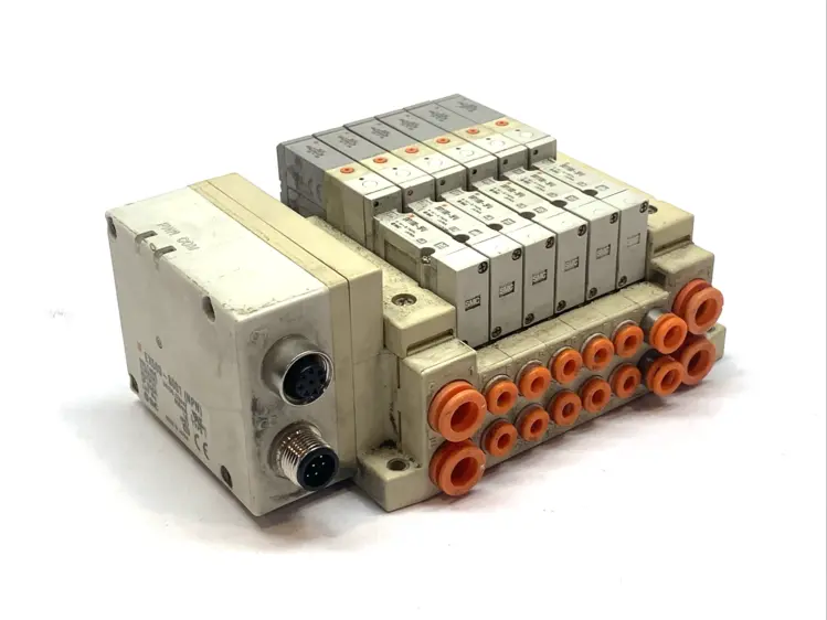 Used SMC Pneumatic Manifold w/ SV1100-5FU Solenoid Valves Solenoid Valves Michigan US | Maverick Industrial Sales #1395614