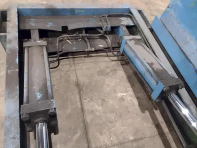 20,000 LBS X 54" X 36" BRANER HYDRAULIC COIL CAR UPENDER WITH POWER FEED CONVEYOR: YOBRO #25238