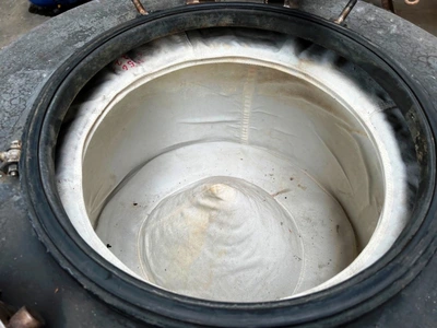 Comi-Condor 700mm perforate basket centrifuge, rubber-lined.