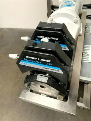 USED DOUBLE MASTER FLEX I/P 77601-60 PERISTALTIC PUMP SKID W/ 1/2 HP MOTOR & DRIVE