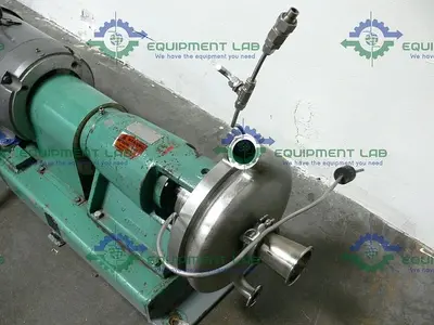 USED TRI-CLOVER TRI-FLO PUMP SP218MH-S W/ 10HP BALDOR INDUSTRIAL MOTOR CM3711T