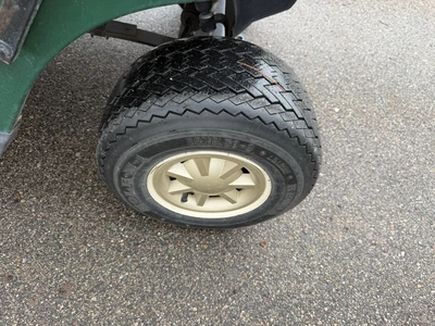 (1) 2014 E-Z-Go golf cart with a Kawasaki gas engine, does not include Club canopy, ball carrier, fo...