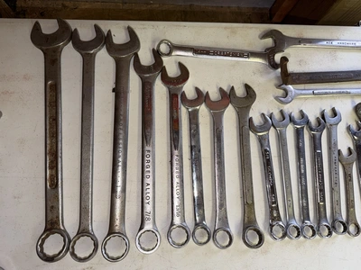 (1) tool box filled with assorted box end wrenches.