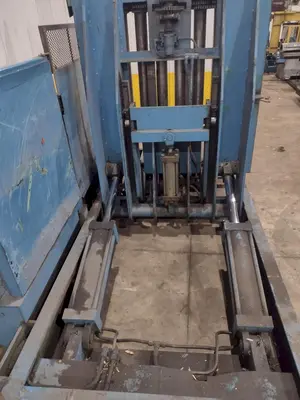 20,000 LBS X 54" X 36" BRANER HYDRAULIC COIL CAR UPENDER WITH POWER FEED CONVEYOR: YOBRO #25238