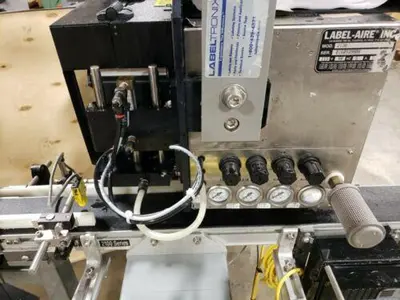 Label-Tronix, labeling system with Lable-Aire 2138 & Reliant 2700 feeder