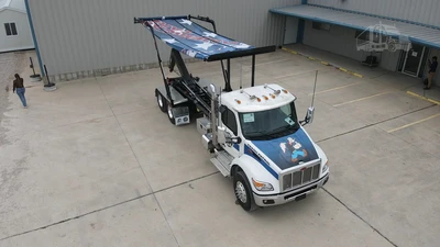 Used 2027 PETERBILT 548 Hooklifts & Roll-Offs Texas US | Roll Off Truck World #1491992