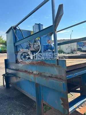USED HYDRAPAK MODEL 1500 2 YARD STATIONARY WITH 40 YARD RECEIVER BOX
