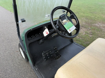 (1) 2015 E-Z-Go golf cart with a Kawasaki gas engine, includes canopy, ball cover, club cover, fold-...