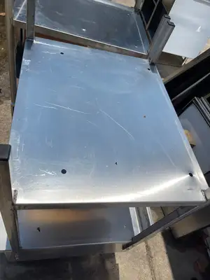 Used Pro Stainless Inc Used Stainless Commercial Equipment Double Oven Stand Stack with Caster Wheels - SS86 Oven Cabinets Illinois US | Falcon Restaurant Supply #1376128