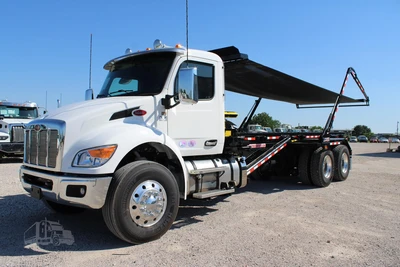 New | in-Stock 2027 PETERBILT 548 Hooklifts & Roll-Offs Texas US | Roll Off Truck World #1492004