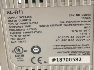 USED KEYENCE SL-R11 SAFETY CONTROL UNIT W/ SL-U2 POWER SUPPLY SLR11